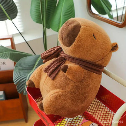 Peluche Capybara Frileux en écharpe