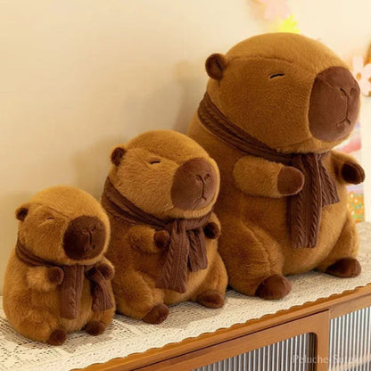 Peluche Capybara Frileux en écharpe
